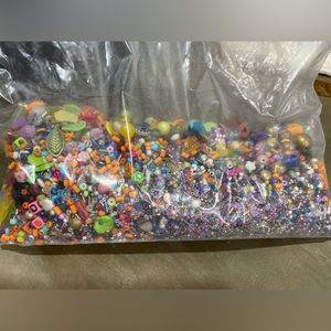 Bag of random loose beads. Plastic, glass, wood and metal